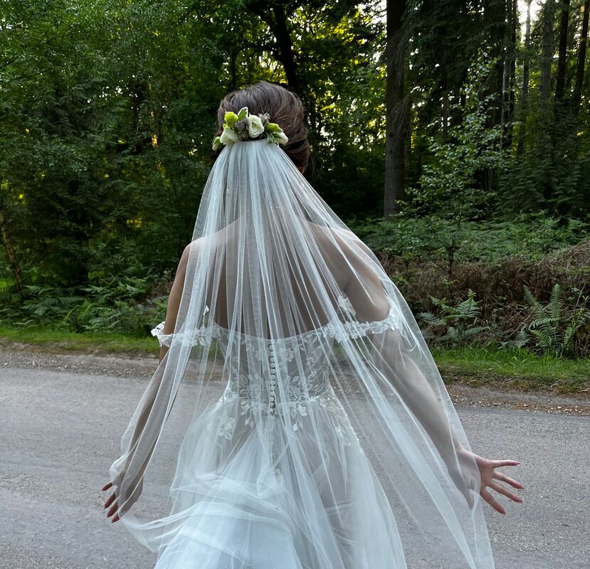 Wedding dress and bespoke veil created by Pink Couture