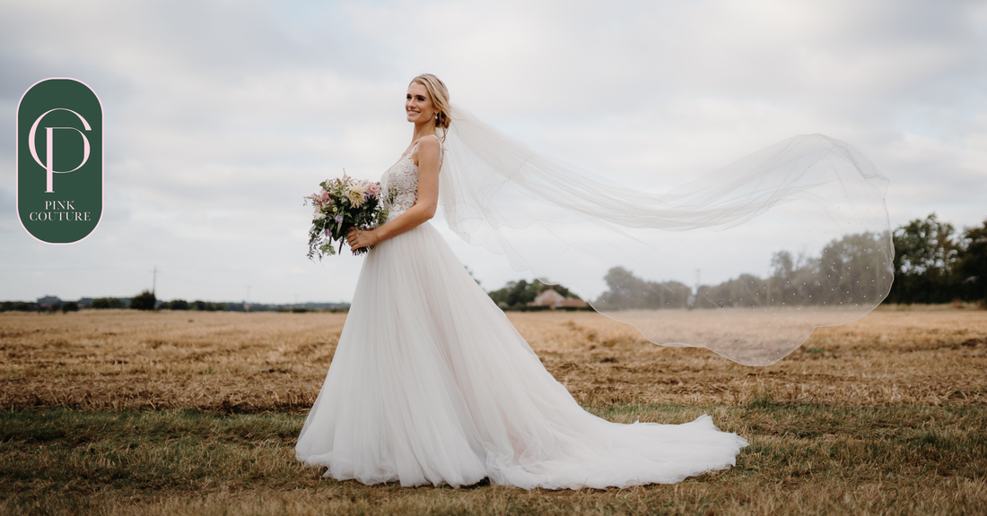 A bride wearing a Pink Couture tailored wedding dress as part of her Norfolk wedding